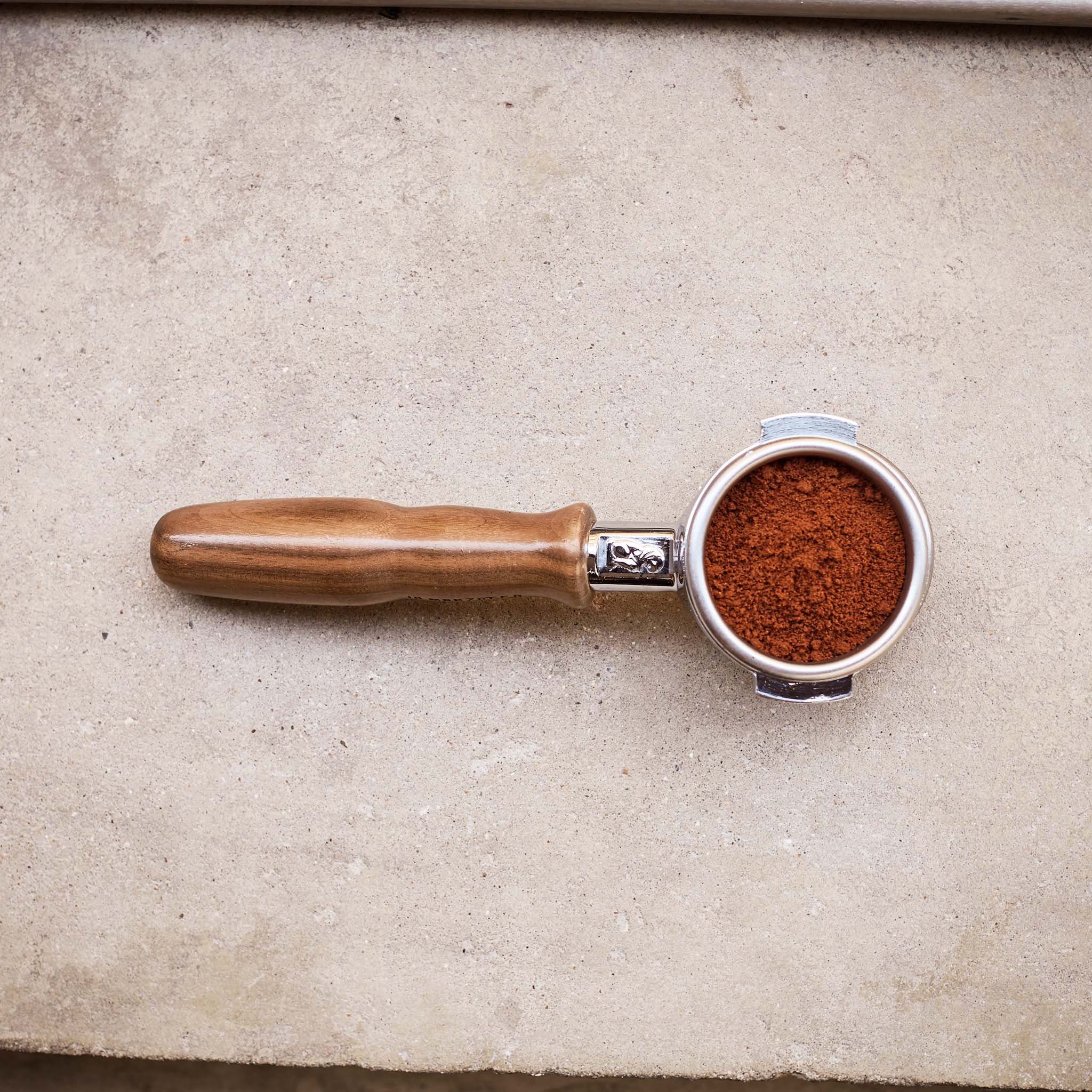 Coffee portafilter with espresso in
