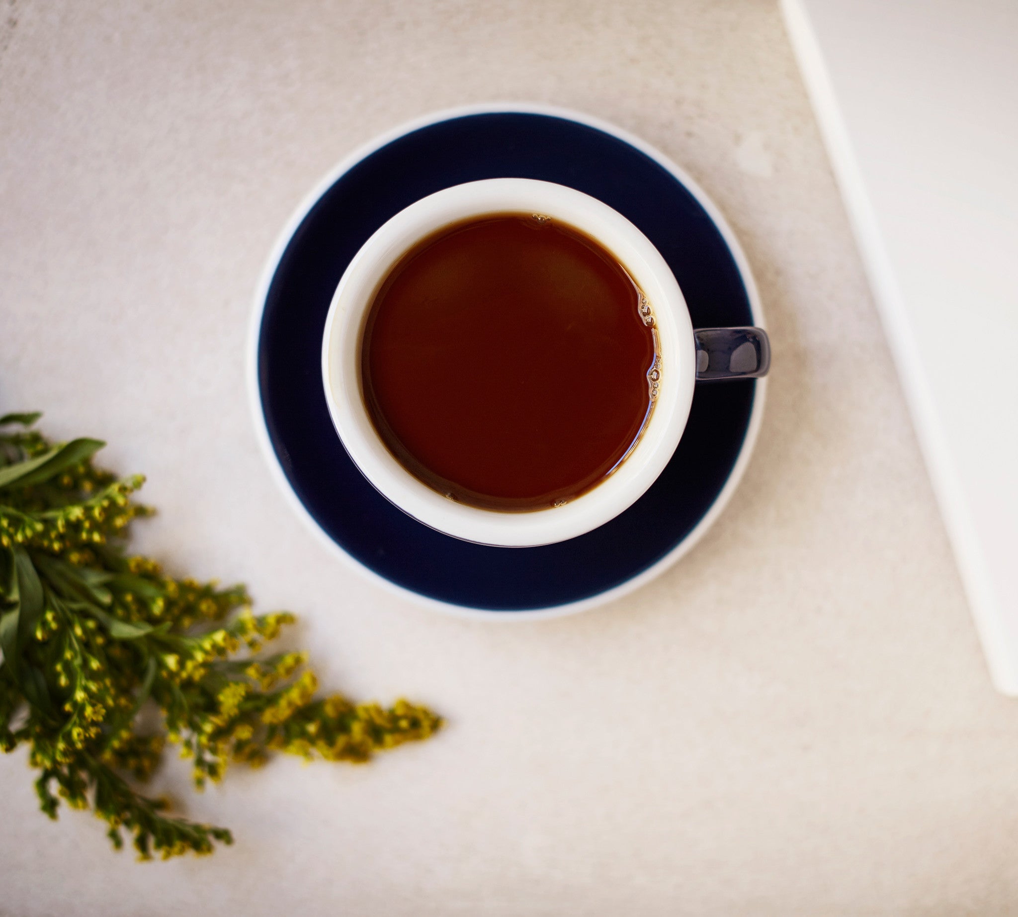 Cup of filter coffee on table
